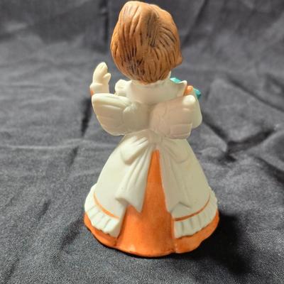 Vintage Schmid Brothers Christmas angel figurine and a ceramic December angel bell.