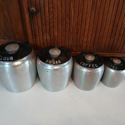 Vintage MCM Kromex spun aluminum canister set from the 1950s.
