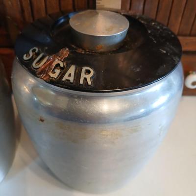 Vintage MCM Kromex spun aluminum canister set from the 1950s.