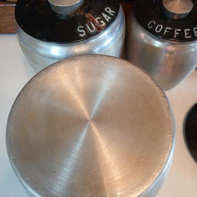 Vintage MCM Kromex spun aluminum canister set from the 1950s.