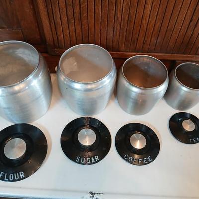 Vintage MCM Kromex spun aluminum canister set from the 1950s.