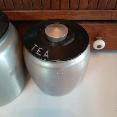 Vintage MCM Kromex spun aluminum canister set from the 1950s.