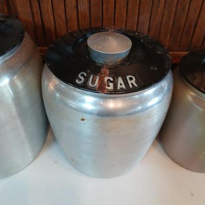 Vintage MCM Kromex spun aluminum canister set from the 1950s.