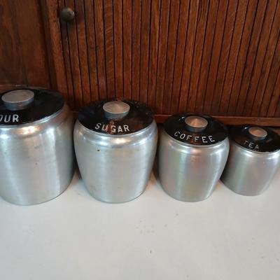 Vintage MCM Kromex spun aluminum canister set from the 1950s.