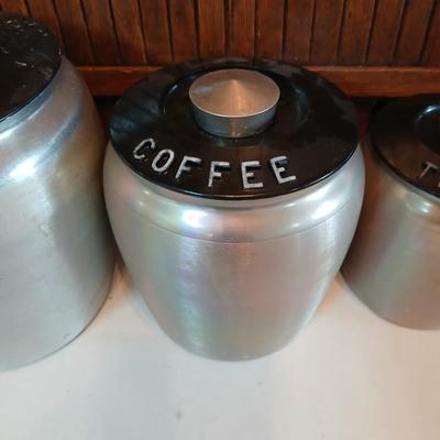 Vintage MCM Kromex spun aluminum canister set from the 1950s.
