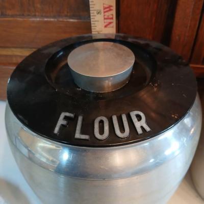 Vintage MCM Kromex spun aluminum canister set from the 1950s.