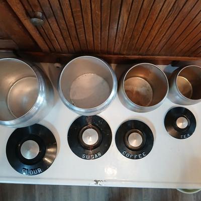 Vintage MCM Kromex spun aluminum canister set from the 1950s.