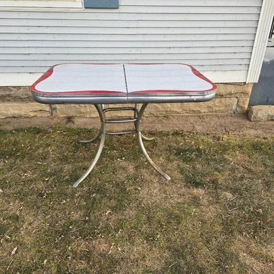 Vintage 1950s Mid-Century Modern gray and red Formica dinette table with chrome legs.