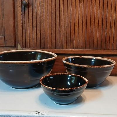 Set of three vintage- Nesting glazed brown stoneware drip edge bowls