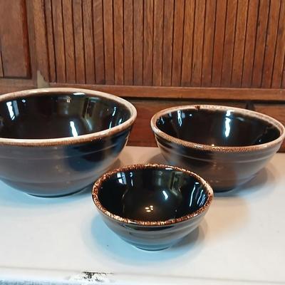 Set of three vintage- Nesting glazed brown stoneware drip edge bowls