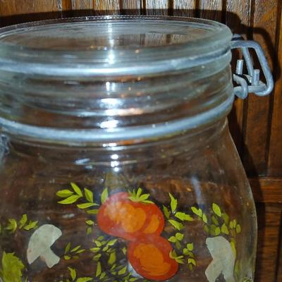 vintage glass canisters with a "Spice of Life" pattern, made by ARC in France. 1 & 2 Liter Jars with a trivet