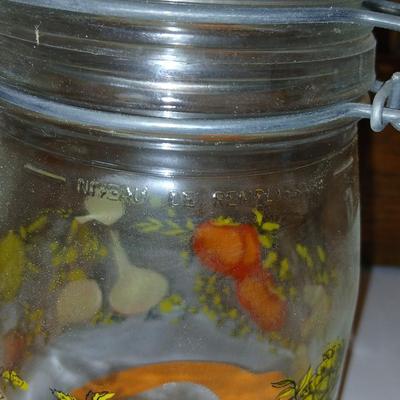vintage glass canisters with a "Spice of Life" pattern, made by ARC in France. 1 & 2 Liter Jars with a trivet