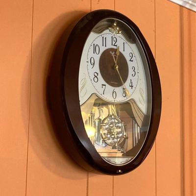 LOT 57: Vintage Small World Rhythm Wall Clock