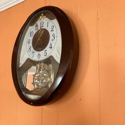 LOT 57: Vintage Small World Rhythm Wall Clock