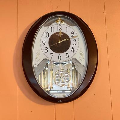 LOT 57: Vintage Small World Rhythm Wall Clock