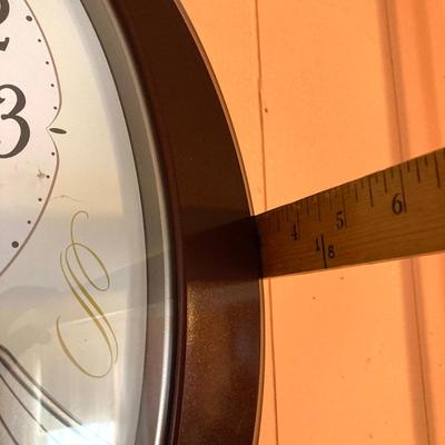 LOT 57: Vintage Small World Rhythm Wall Clock