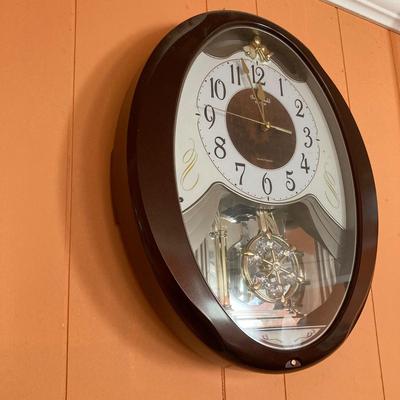 LOT 57: Vintage Small World Rhythm Wall Clock