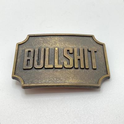 LOT 66: Belt Buckles and More - Bullshit, The Babcock & Wilcox Co., Sun Ship Leather Key Holder,