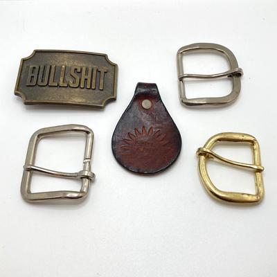 LOT 66: Belt Buckles and More - Bullshit, The Babcock & Wilcox Co., Sun Ship Leather Key Holder,