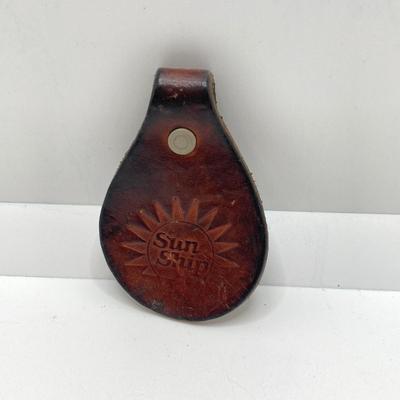 LOT 66: Belt Buckles and More - Bullshit, The Babcock & Wilcox Co., Sun Ship Leather Key Holder,