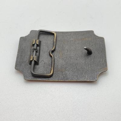 LOT 66: Belt Buckles and More - Bullshit, The Babcock & Wilcox Co., Sun Ship Leather Key Holder,