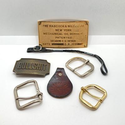 LOT 66: Belt Buckles and More - Bullshit, The Babcock & Wilcox Co., Sun Ship Leather Key Holder,