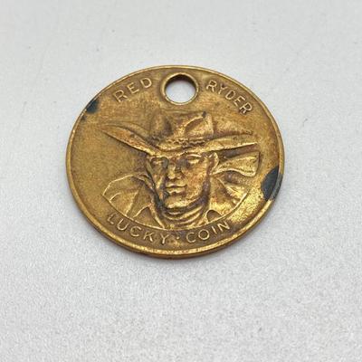 LOT 73: Vintage Red Ryder Collection - Pocket Knives, Books, Lucky Coin / Token and Card