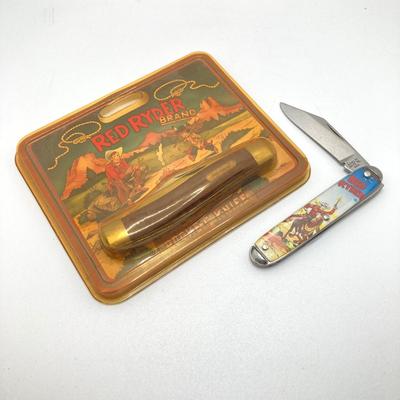 LOT 73: Vintage Red Ryder Collection - Pocket Knives, Books, Lucky Coin / Token and Card