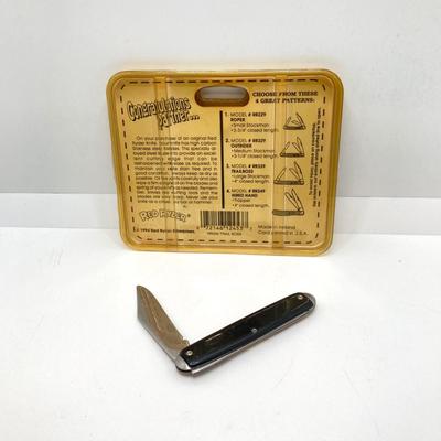 LOT 73: Vintage Red Ryder Collection - Pocket Knives, Books, Lucky Coin / Token and Card