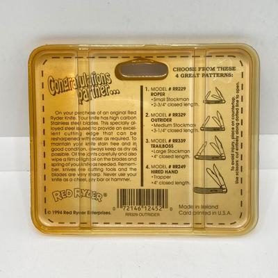 LOT 74: Collection of Red Ryder Memorabilia - Pocket Knives, Limited Edition Belt Buckle, Pocket Watch and More