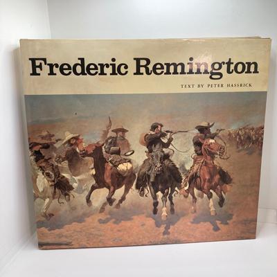 LOT 77: Vintage John Wayne Quartz Wall Clock with Collection of Books