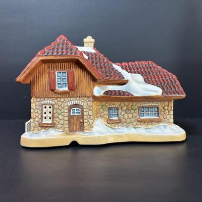 LOT 86: M.J. Hummel Holiday Village: Heavenly Harmony Church & All Aboard Bahnhof Bavarian Cottage