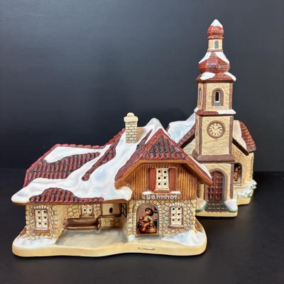 LOT 86: M.J. Hummel Holiday Village: Heavenly Harmony Church & All Aboard Bahnhof Bavarian Cottage