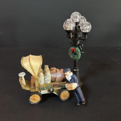 LOT 88: M.J. Hummel Holiday Village Bakery & Christmas Village Acessories