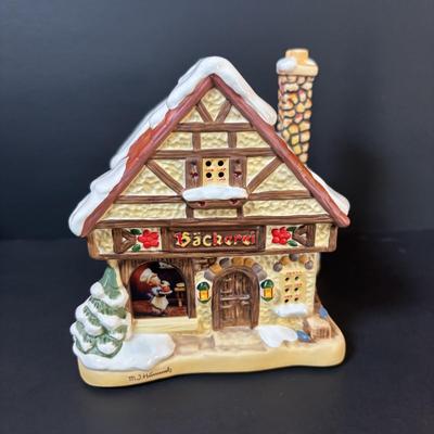 LOT 88: M.J. Hummel Holiday Village Bakery & Christmas Village Acessories