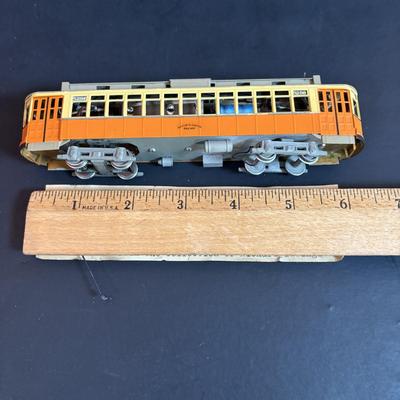 LOT 94: Vintage Putnam's Handy Map Book, Vintage Road Maps, Vintage Railway Share Plaque, HO Scale Boston Elevated Type 5 Streetcar,...