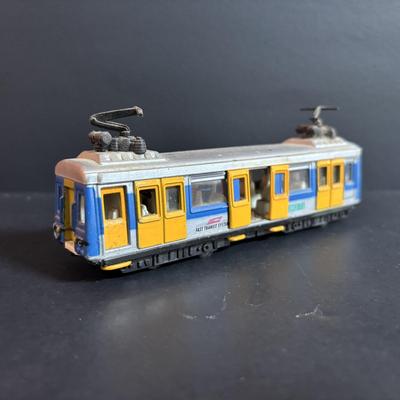 LOT 94: Vintage Putnam's Handy Map Book, Vintage Road Maps, Vintage Railway Share Plaque, HO Scale Boston Elevated Type 5 Streetcar,...