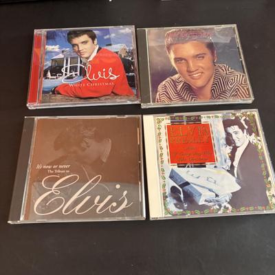 LOT 98: Elvis Presley Collection: Stamps, 8-Tracks, Magazines along with A Century of Country Book