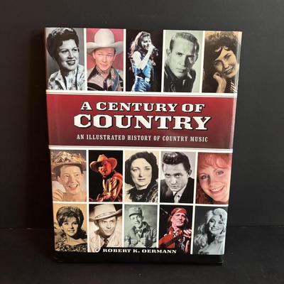 LOT 98: Elvis Presley Collection: Stamps, 8-Tracks, Magazines along with A Century of Country Book