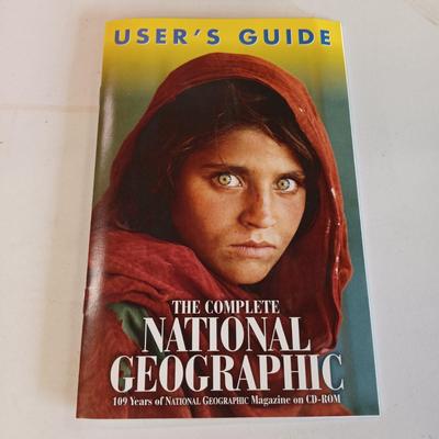 LOT 126: National Geographic 1975 Atlas of the World, On Assignment Board Game & Magazines on CD-ROM
