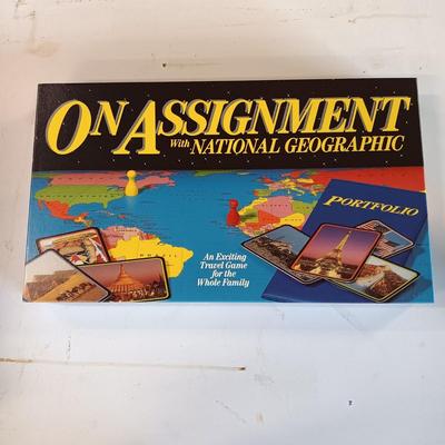 LOT 126: National Geographic 1975 Atlas of the World, On Assignment Board Game & Magazines on CD-ROM