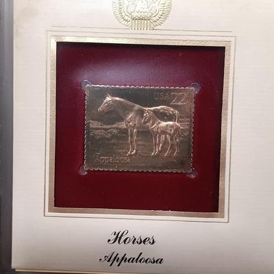 LOT 157: Postal Commemorative Society 22kt Gold Proof Replicas of US Stamps (23 Pages)