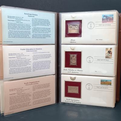 LOT 157: Postal Commemorative Society 22kt Gold Proof Replicas of US Stamps (23 Pages)