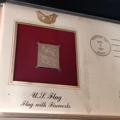 LOT 157: Postal Commemorative Society 22kt Gold Proof Replicas of US Stamps (23 Pages)