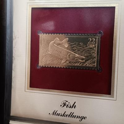 LOT 157: Postal Commemorative Society 22kt Gold Proof Replicas of US Stamps (23 Pages)