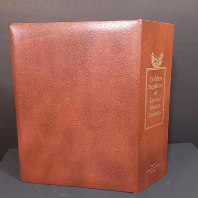 LOT 157: Postal Commemorative Society 22kt Gold Proof Replicas of US Stamps (23 Pages)