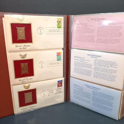 LOT 158: Postal Commemorative Society 22kt Gold Proof Replicas of US Stamps (14 Pages)