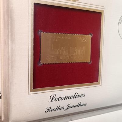 LOT 158: Postal Commemorative Society 22kt Gold Proof Replicas of US Stamps (14 Pages)