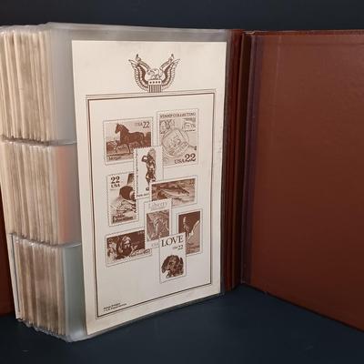 LOT 158: Postal Commemorative Society 22kt Gold Proof Replicas of US Stamps (14 Pages)