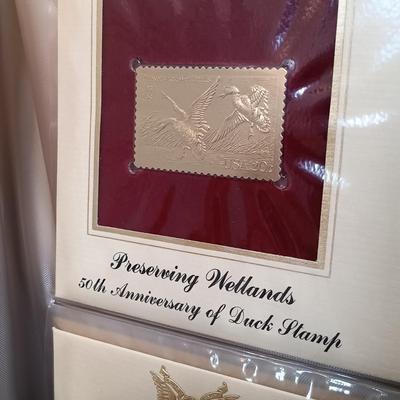 LOT 159: Postal Commemorative Society 22kt Gold Proof Replicas of US Stamps (24 Pages)